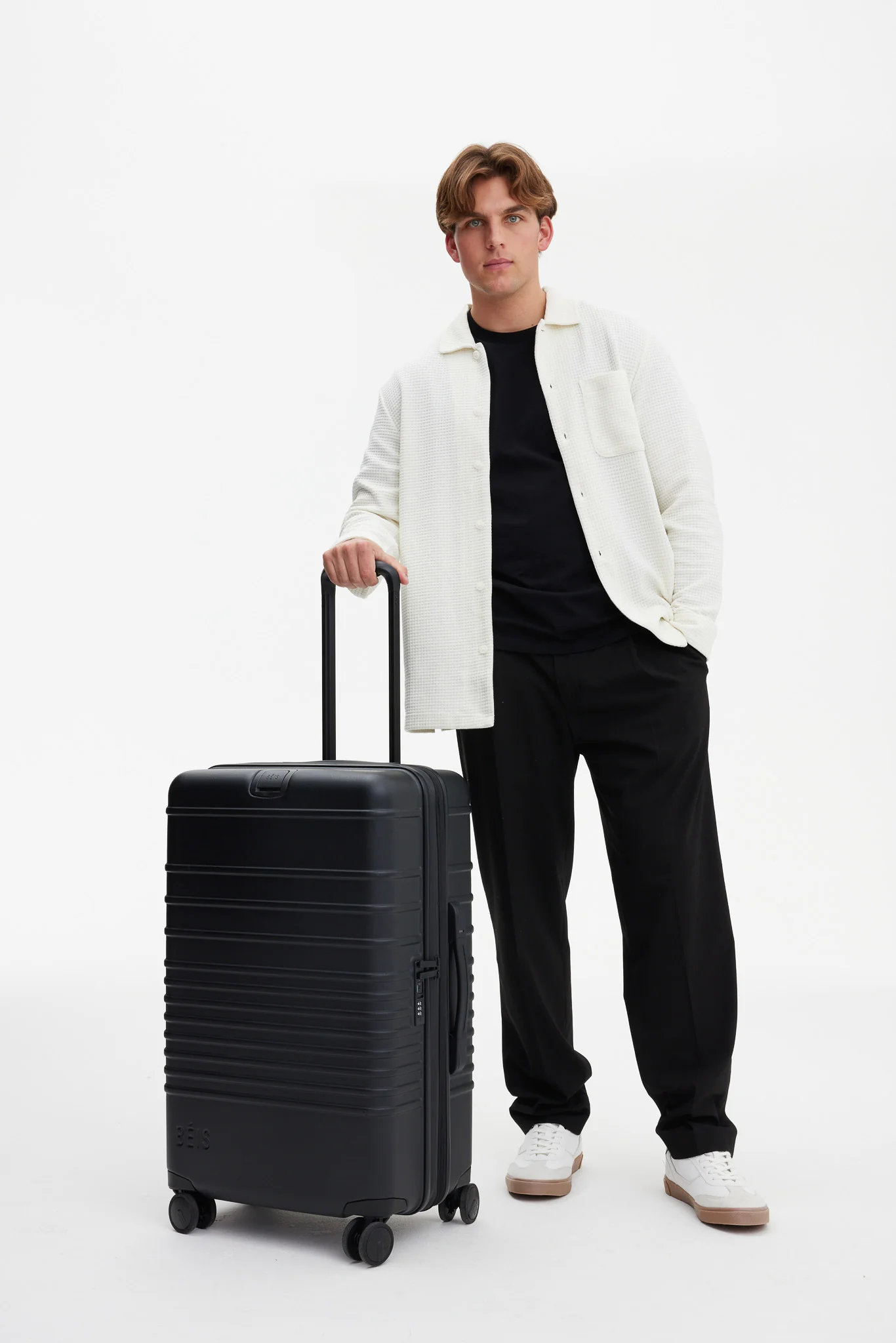 The Medium Check-In Roller in All Black - Image 5