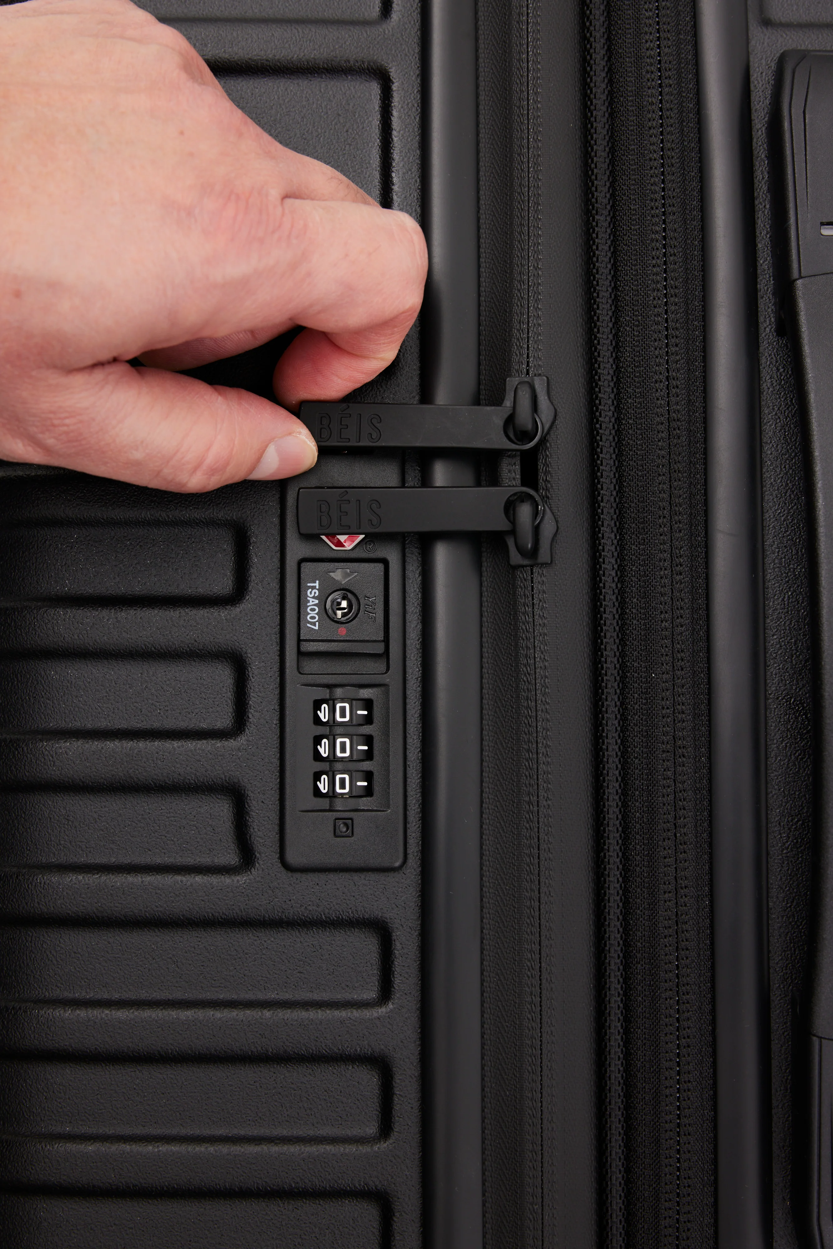 The Medium Check-In Roller in All Black - Image 9