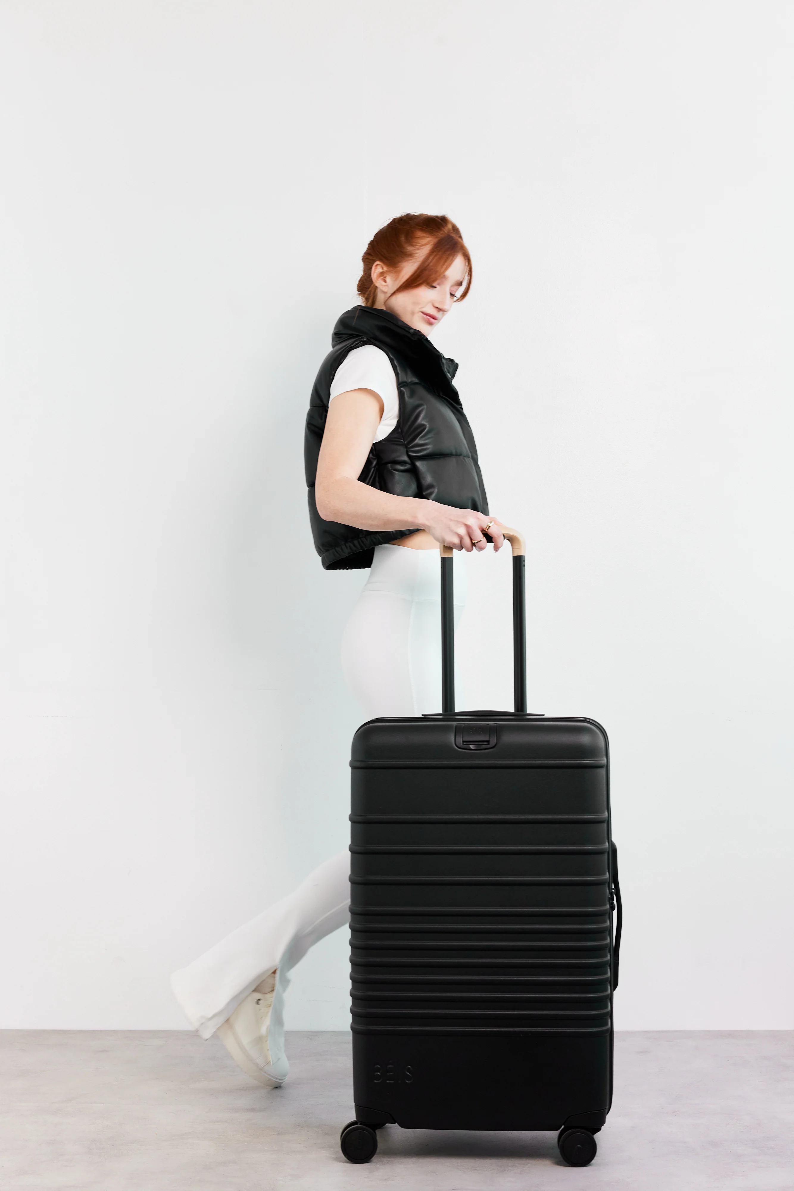 The Medium Check-In Roller in Black - Image 9